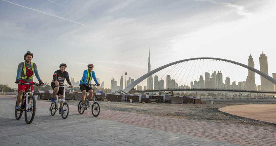 Cyclists in Dubai Water Canal